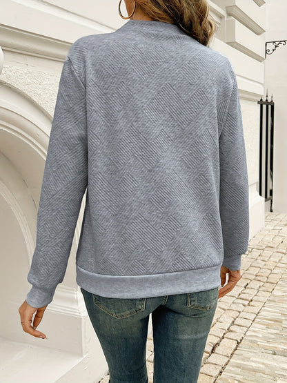 Striktrøje Dame – Asymmetrisk Pullover med Knapper ved Halsen
